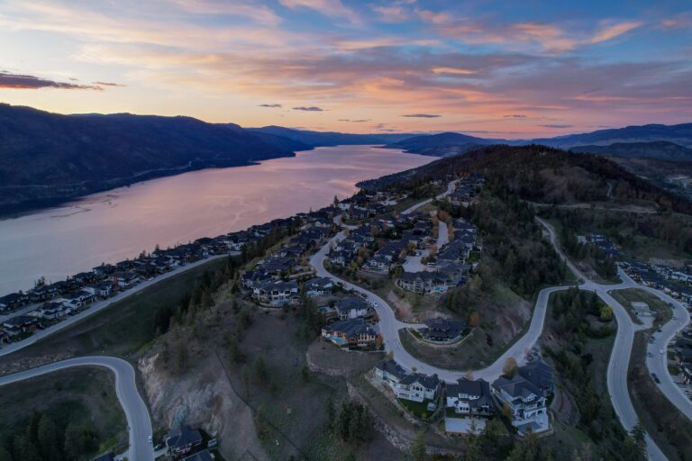 Homes and winding hillside roads above Okanagan Lake at dusk, Upper Mission, Kelowna